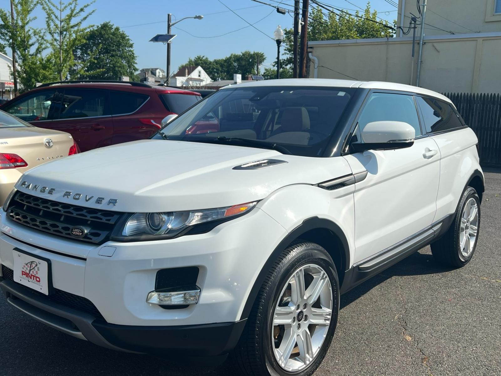 2013 /Beige Land Rover Range Rover Evoque Pure Plus 3-Door (SALVP1BG3DH) with an 2.0L L4 DOHC 24V TURBO engine, 6-Speed Automatic transmission, located at 1018 Brunswick Ave, Trenton, NJ, 08638, (609) 989-0900, 40.240086, -74.748085 - This Range Rover Evoque is beautiful in every way and has been very well maintained and ready for the next owner! Amazing color combo and super clean SUV! Call Anthony to set up an appointment ASAP, 609-273-5100 - Photo #7